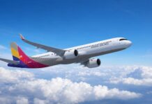 아시아나항공 A321neo 항공기가 하늘을 비행하는 모습, 2026년 1분기 실적 분석 기사 대표 이미지