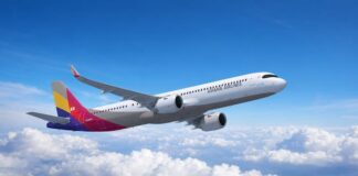 아시아나항공 A321neo 항공기가 하늘을 비행하는 모습, 2026년 1분기 실적 분석 기사 대표 이미지