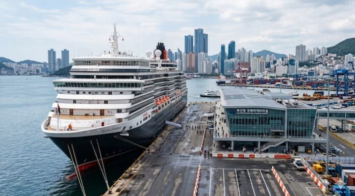Why Busan, Incheon and Jeju Have Not Become True Cruise Hubs A large cruise ship docked at a modern Korean port terminal with a city skyline and harbor facilities in the background