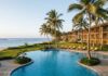 Saipan’s Decline Shows the Cost of Failing to Plan Beyond the Peak Saipan resort coastline after its tourism peak, showing aging facilities and a quiet poolside area