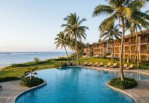 Saipan’s Decline Shows the Cost of Failing to Plan Beyond the Peak Saipan resort coastline after its tourism peak, showing aging facilities and a quiet poolside area