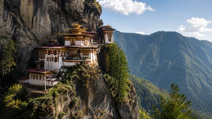 Bhutan Himalayan monastery and mountain landscape representing spiritual and wellness travel for Korean travelers