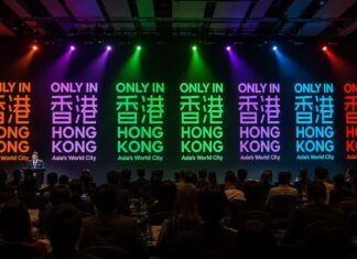 Only in Hong Kong stage with colorful lights at a Hong Kong travel mission event