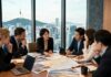 Travel industry professionals discussing Korean market strategy in a high-rise meeting room overlooking Seoul