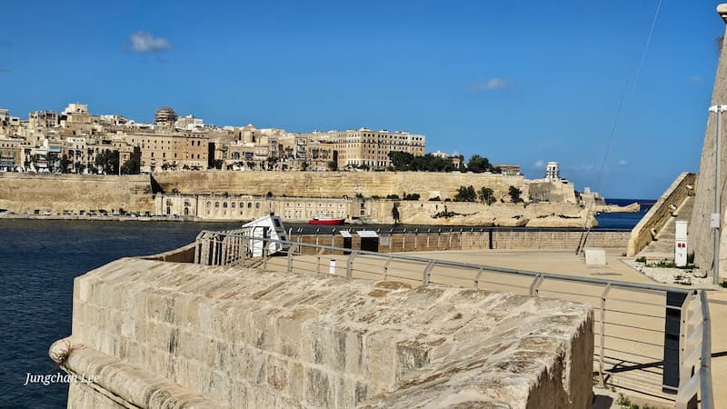 A wide daytime view of Malta’s fortress walls and Grand Harbour
