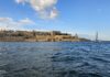 Malta seaward fortifications and sailing boat in Grand Harbour
