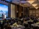 The Secret to Your Success in the Korean Market ② Practice Strategic Storytelling A formal tourism promotion event for travel industry representatives in a luxury hotel ballroom